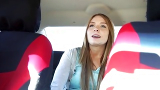 Long haired kinky slut is posing sexually nice in the car